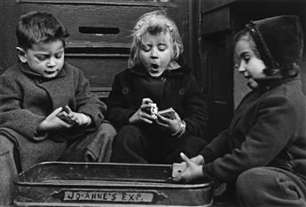 (RUTH ORKIN) (1921-1985) The Card Players, a suite of 6 photographs.